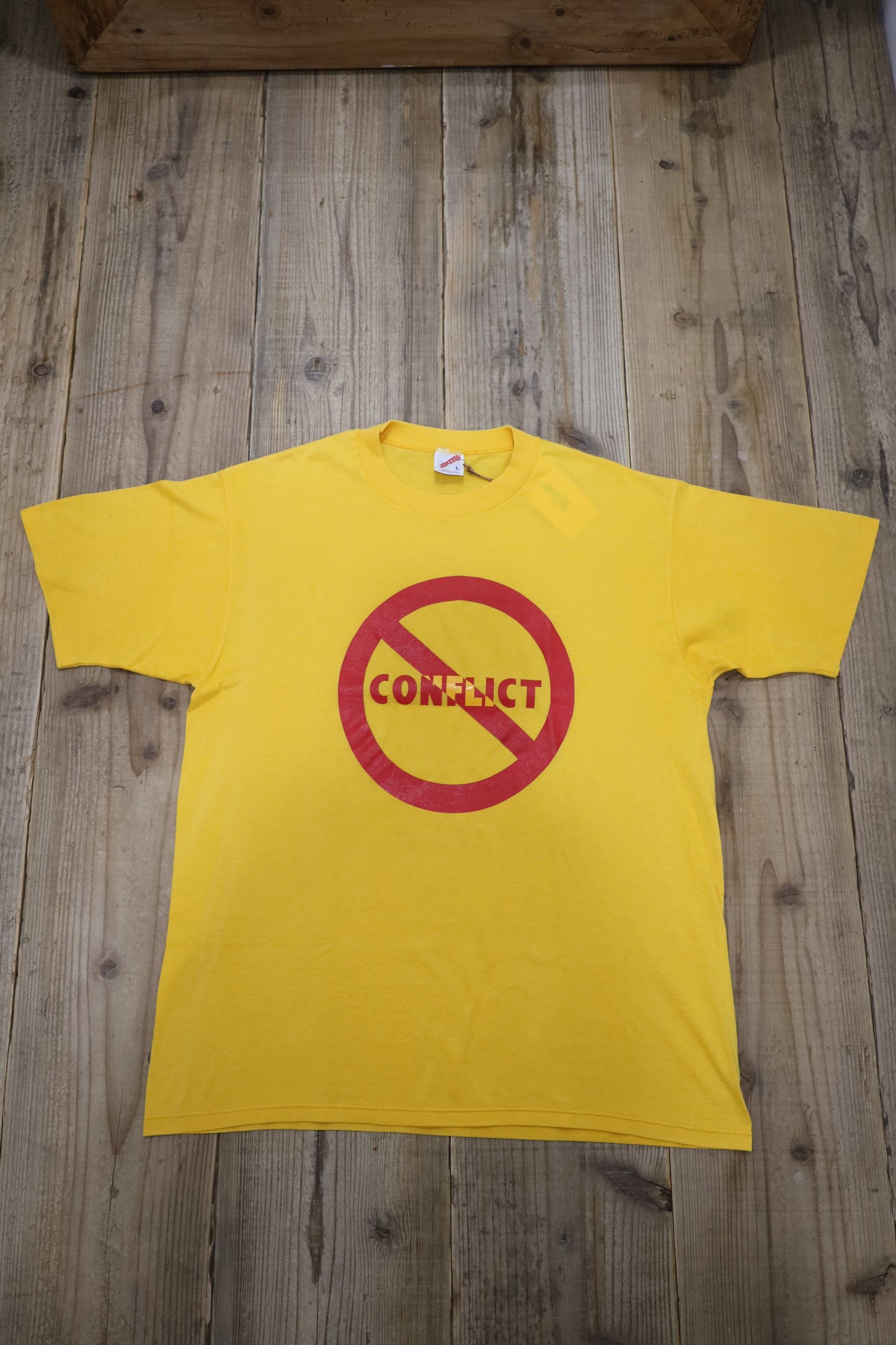 317 / 1990’s OLD TEE JERZEES CONFLICT LOGO