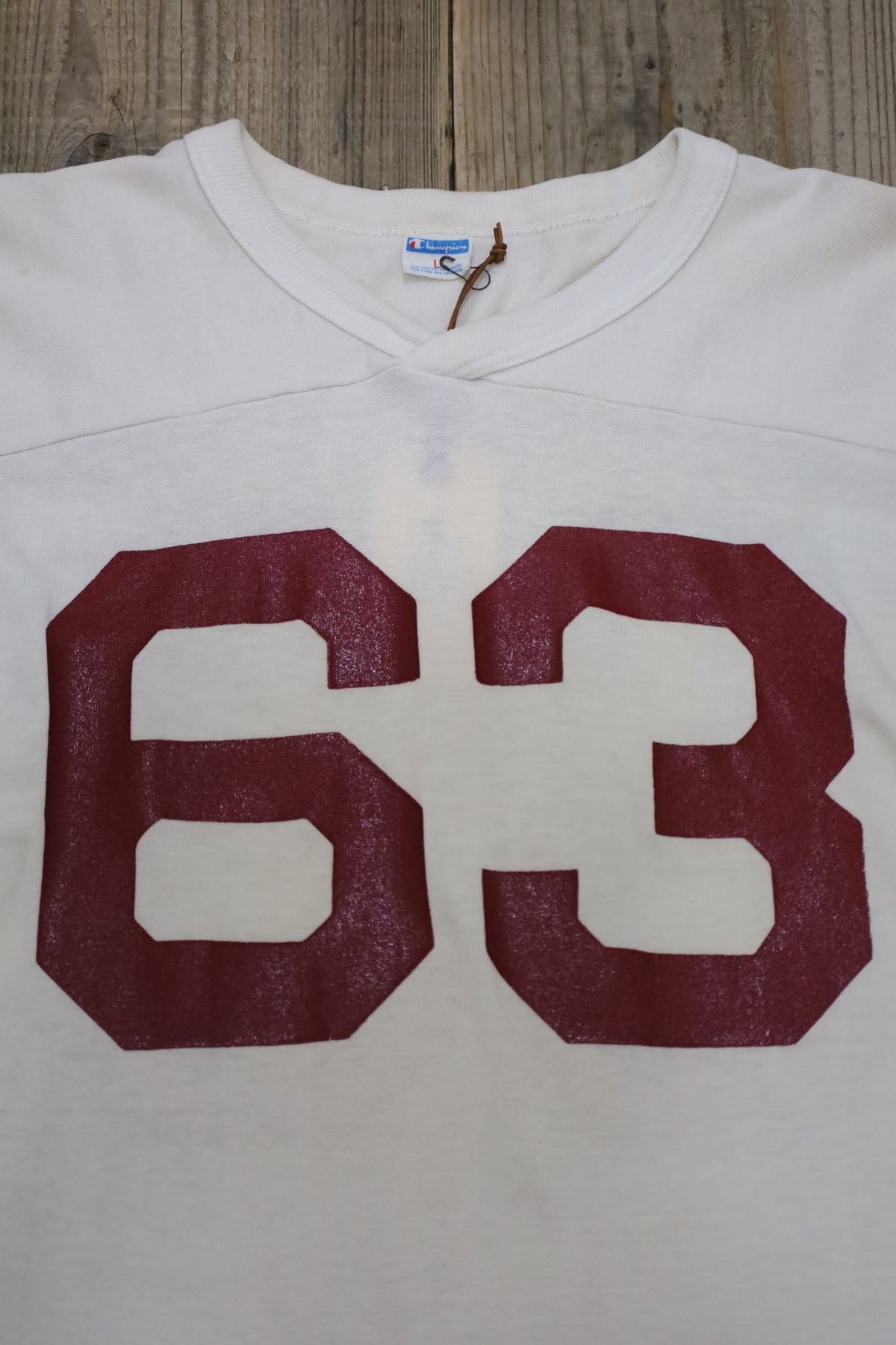 E783 / 1970's champion football tee